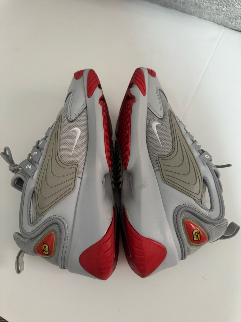 Nike White and Gray Sneakers with Red Accents - Picture 5 of 7